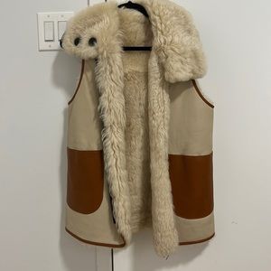 Coach Reversible leather/shearling vest. One size